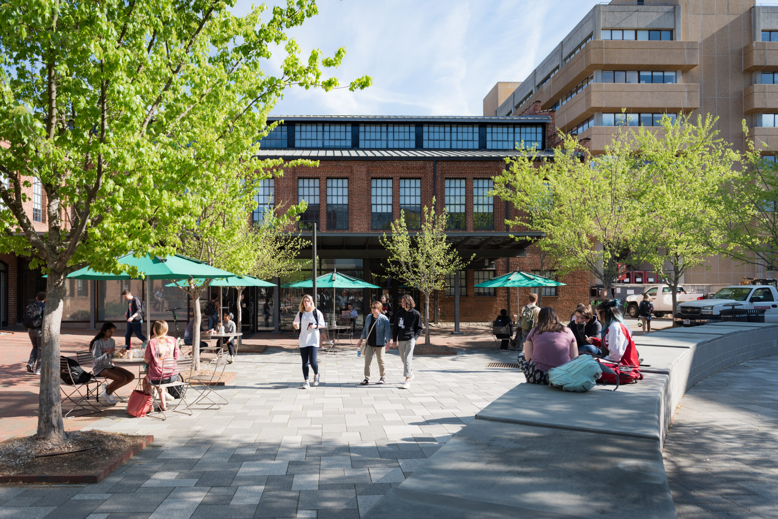 Students walk in front of Park Shops